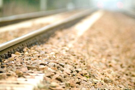 railroad tracks from the perspective of low, near the ground