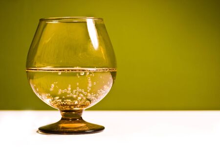 glass vessels standing on the white table, isolated backgroundの写真素材