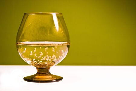 glass vessels standing on the white table, isolated backgroundの写真素材