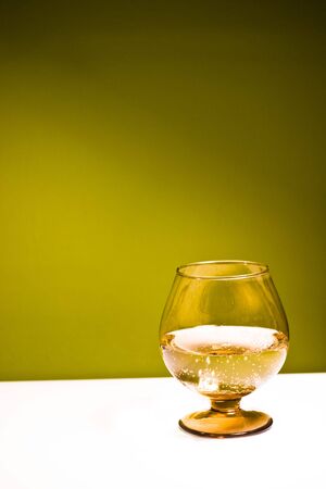 glass vessels standing on the white table, isolated backgroundの写真素材