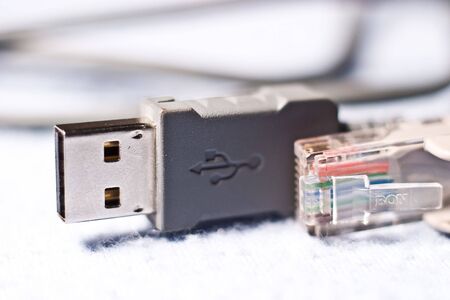 Network cable connector detail isilated on white background
の写真素材