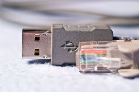 Network cable connector detail isilated on white backgroundの写真素材
