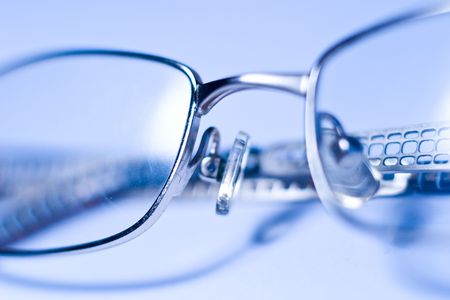 stylish glasses lying on a white background, macroの写真素材