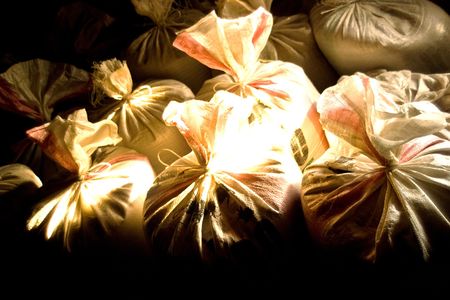 old bags of grain stored for many yearsの写真素材