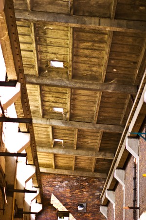 Wide angle view of an old wall abandoned factory building
