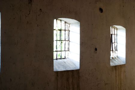 Discarded ruin with old windows and wall, industrial window in concrete wall

の写真素材