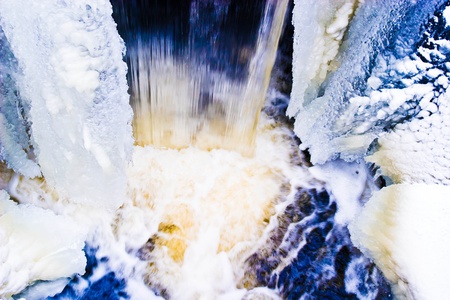 Water plummets many feet down the face  in eastern Polandの写真素材