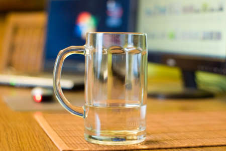 glass vessels standing on the white table, isolated backgroundの写真素材