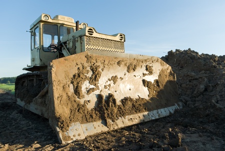 digger, Heavy Duty construction equipment parked at work siteの写真素材