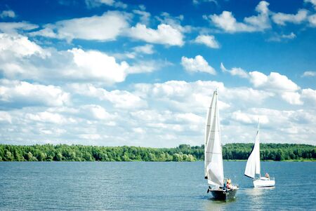  yachts on an anchor in harbor, boats seriesの写真素材