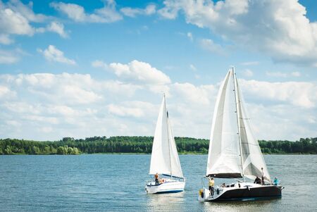  yachts on an anchor in harbor, boats seriesの写真素材