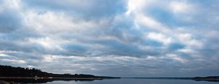 blue lake with cloudy sky, nature series