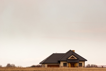 family home with garage, family house over blue sky, hauses seriesのeditorial素材