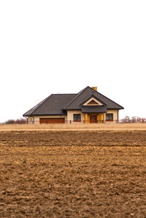 family home with garage, family house over blue sky, hauses seriesのeditorial素材