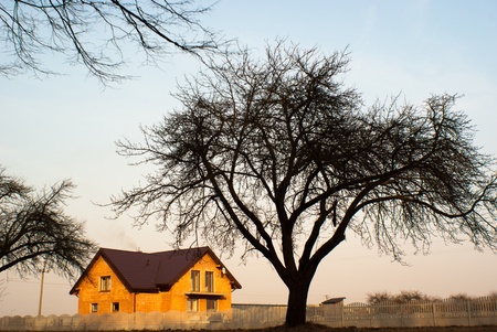 family home with garage, family house over blue sky, hauses series