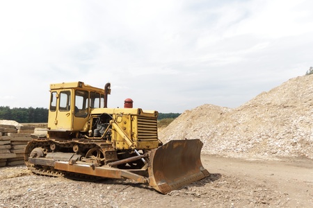 digger, heavy duty construction equipment parked at work site