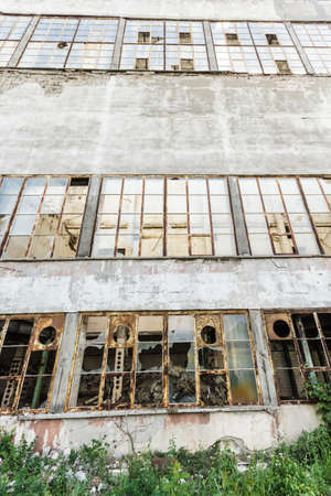 wide angle view of an old wall abandoned factory buildingのeditorial素材
