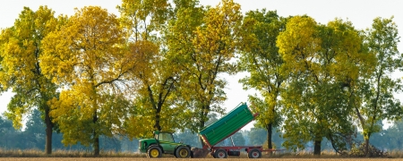 working agicultural machinery in sunny day, machinery seriesのeditorial素材