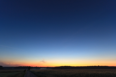 sun behind the clouds on a warm day, nature seriesの写真素材