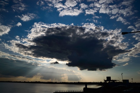 sun behind the clouds on a warm day, nature seriesの写真素材