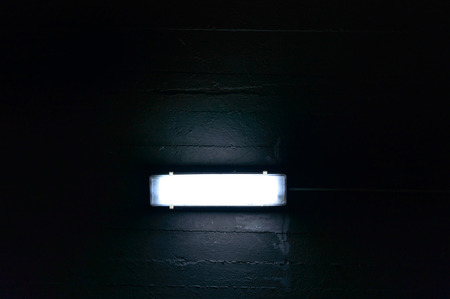 shot of a garage lamp, lamp for night reading and workingの写真素材