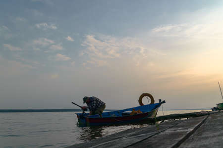 boat on the blue lake with cloudy sky, nature seriesのeditorial素材