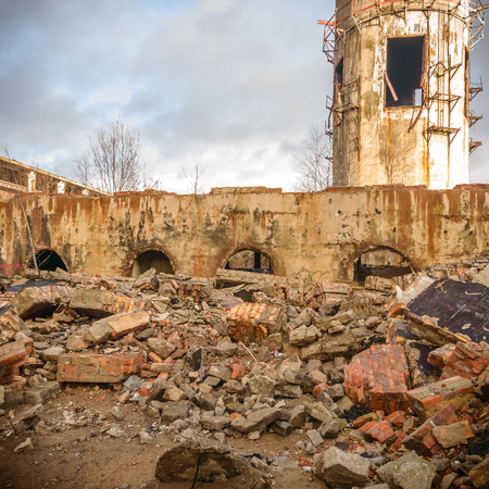wide angle view of an old wall abandoned factory buildingの写真素材