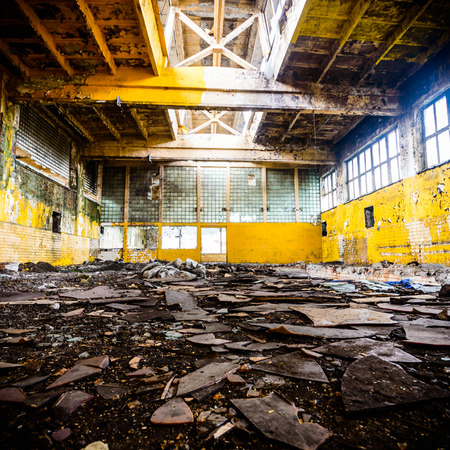 wide angle view of an old wall abandoned factory buildingの写真素材