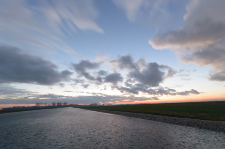 country road leading up to the horizon line , nature seriesの写真素材