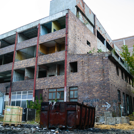 wide angle view of an old wall abandoned factory buildingの写真素材