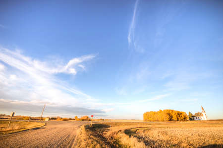 country road leading up to the horizon line , nature seriesの写真素材