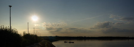 sun behind the clouds on a warm day, nature seriesの写真素材