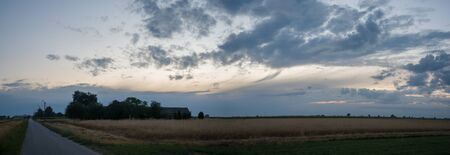 sun behind the clouds on a warm day, nature seriesの写真素材