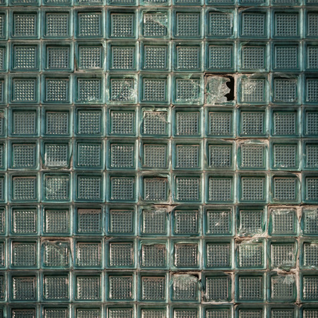 discarded ruin with old windows and wall, industrial window in concrete wallの写真素材