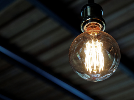 Modern light bulb with concepts of idea, concept, and decision