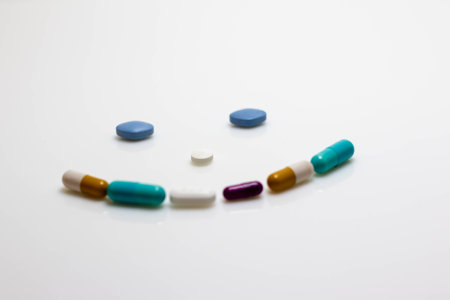 Concept image of a smiley face made of pills.の写真素材