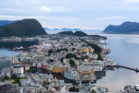 Beautiful super wide-angle summer aerial view of Alesund, Norway, with skyline and scenery beyond the city, seen from the observation deck of Aksla mountainのeditorial素材