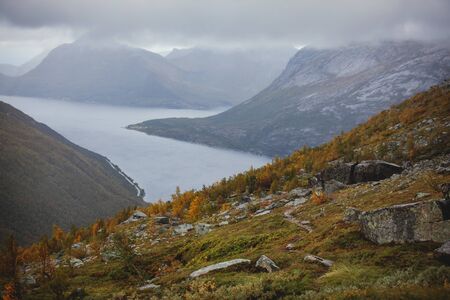 Norwegian mountain landscape during hiking to Halls Fortopp peak, with a view on Stetind, Northern Norway, Nordland county, municipality of Tysfjord, Ofoten, with fjord and lakeの写真素材