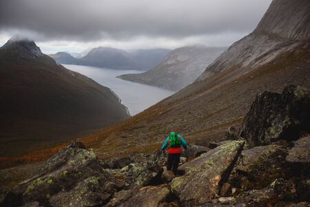 Norwegian mountain landscape during hiking to Halls Fortopp peak, with a view on Stetind, Northern Norway, Nordland county, municipality of Tysfjord, Ofoten, with fjord and lakeの写真素材