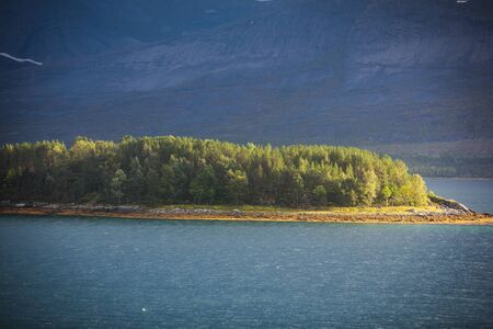 Classic Norwegian cold panoramic landscape of Efjorden fjord, Ballangen municipality, Nordland county, Ofoten district, Norway with Efjord Bridges, Stortinden mountain, Northern Norwayの写真素材