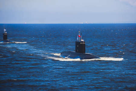 A line ahead of modern russian military naval battleships warships in the row, northern fleet and...