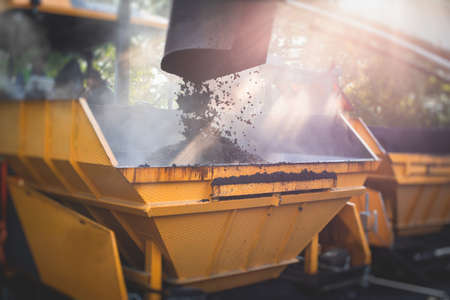 Process of asphalting, blacktopping and paving, asphalt paver machine and steam roller compactor...