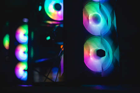 View of Gaming PC with rgb led lights, powerful high end personal computer, assembled with hardware components, at home or in cybersport club arenaの写真素材