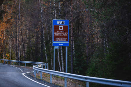 Autumn view of Oulanka National Park, landscape, a Finnish national park in the Northern Ostrobothnia and Lapland regions of Finland, wooden wilderness hut, cabin cottage, bridge, campgroundの写真素材