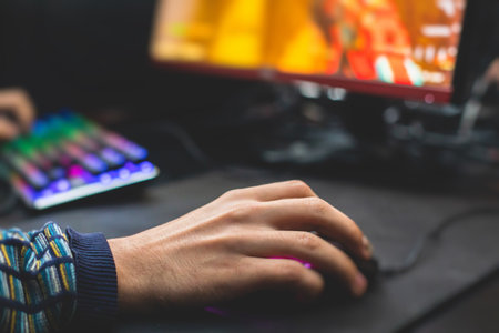 Cyber sport e-sports tournament, team of professional gamers, close-up on gamer's hands on a...