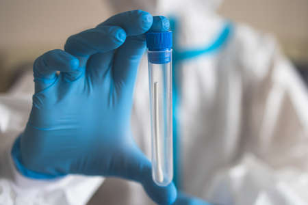 Process of coronavirus PCR antigen testing examination by nurse medic in laboratory lab, COVID-19...