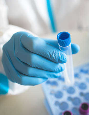 Process of coronavirus PCR antigen testing examination by nurse medic in laboratory lab, COVID-19...