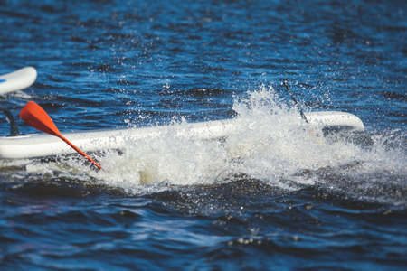 View of floorball match game, court hall indoor venue with junior teenage children school team playing in the background, floor ball hockey match game on the arena stadium, copy spaceの写真素材
