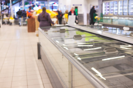 View of empty supermarket shelves, grocery store work stoppage closes, sanctions and embargo, panic buying with supplies and goods shortage, food hunger crisis and deficit conceptの写真素材