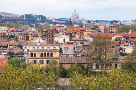 Rome panorama, Lazio, Italy, beautiful panoramic vibrant summer wide view of Roma and Vatican, with cathedral, cityscape and scenery beyond the city, seen from observation deckの写真素材